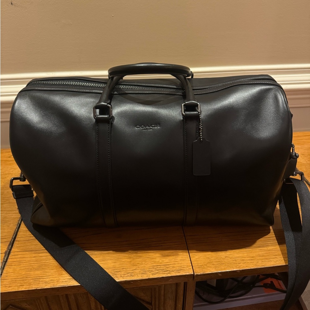 Coach Black Leather Duffel Bag with Structured Design